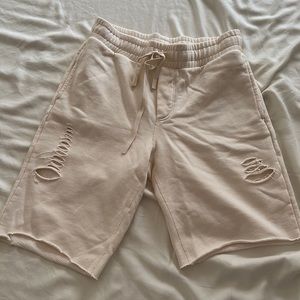 Alo cream shorts with cut outs and rips